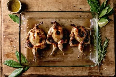 Roasted grilled quails Stock Photos