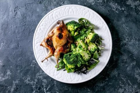 Roasted grilled quails Stock Photos