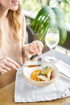 Roasted Halibut with vegetables, paprika pepper and pumpkin cream. Lunch in a Stock Photos
