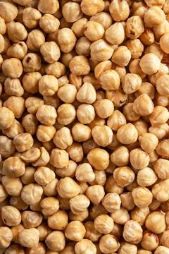 Roasted hazelnuts closeup, shelled nuts background, healthy snack Foto stock
