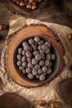 Roasted hazelnuts covered with chocolate Stock Photos