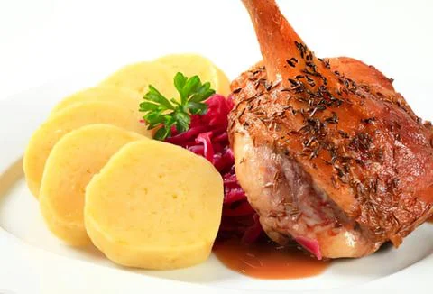 Roasted lamb chop with mashed potatoes and red cabbage Stock Photos