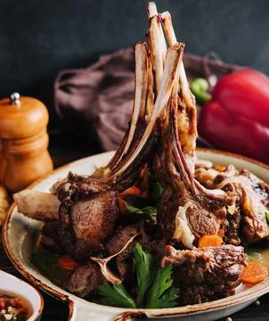 Roasted lamb chops with vegetables Stock Photos