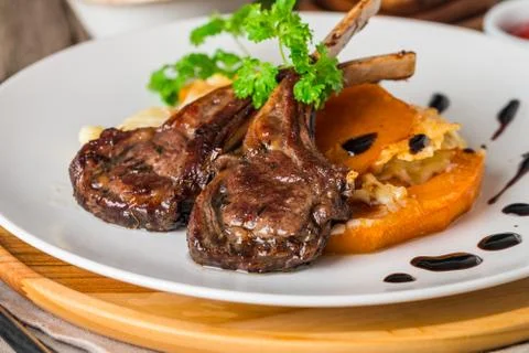 Roasted lamb ribs with  grilled pumpkin Stock Photos