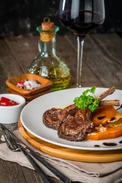 Roasted lamb ribs with  grilled pumpkin Stock Photos