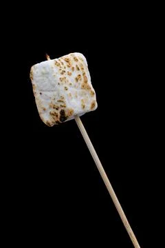 Roasted Marshmallow on a black background Stock Photos