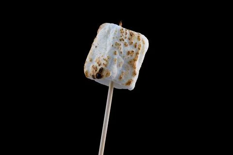 Roasted Marshmallow on a black background Stock Photos