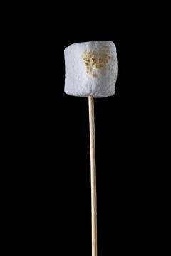 Roasted Marshmallow on a black background Stock Photos