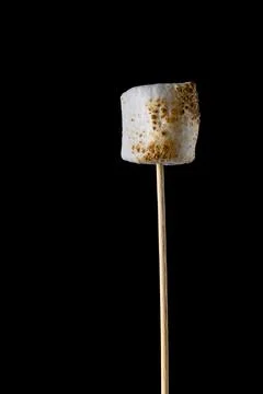Roasted Marshmallow on a black background Stock Photos