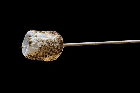 Roasted Marshmallow on a black background Stock Photos