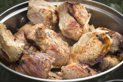 Roasted meat on the coals. Stock Photos