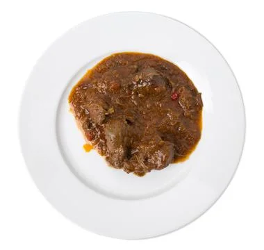 Roasted meat with gravy. Stock Photos