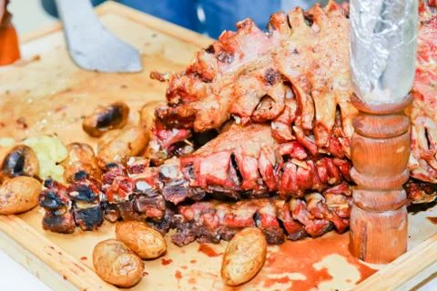 Roasted meat over an open fire, cooked in a special way.Barbecue is prepared Stock Photos