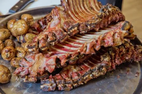 Roasted meat over an open fire, cooked in a special way.Barbecue is prepared Stock Photos