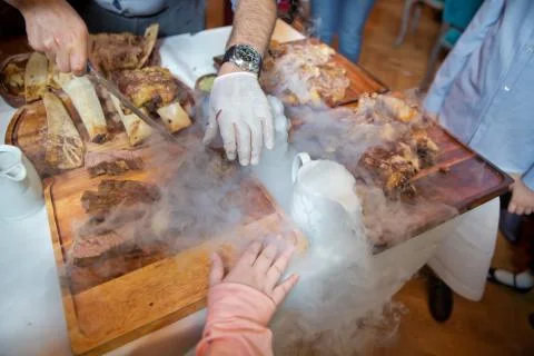 Roasted meat over an open fire, cooked in a special way.Barbecue is prepared  Stock Photos