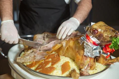 Roasted meat over an open fire, cooked in a special way. Barbecue is prepared Stock Photos
