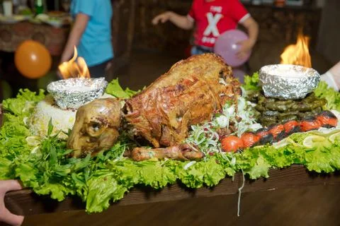 Roasted meat over an open fire, cooked in a special way.Barbecue is prepared of Stock Photos