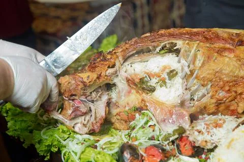 Roasted meat over an open fire, cooked in a special way.Barbecue is prepared of Stock Photos