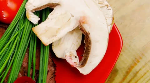 Roasted meat served on red dish 库存影片 26106476