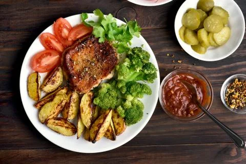 Roasted meat with vegetables Stock Photos