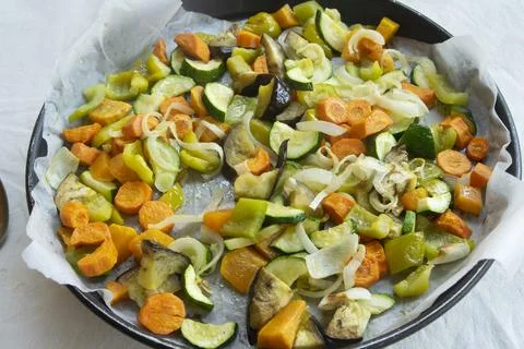 Roasted mixed vegetables on baking tray Stock Photos