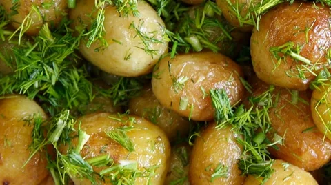 Roasted new potatoes with dill Stock Footage 51625723
