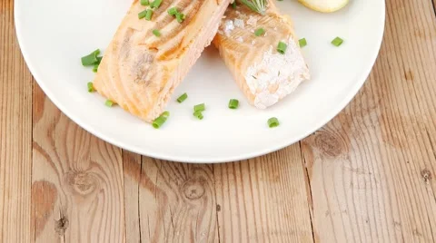 Roasted norwegian salmon chunks and vegetable salad Stock Footage 55779136