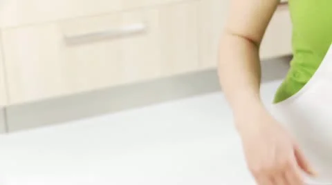 Roasted onion halves being added to a pot of soup 스톡 동영상 24646281