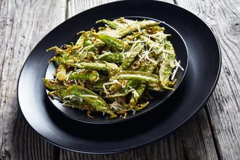 Roasted Parmesan and cornmeal breaded Snow Peas Stock Photos