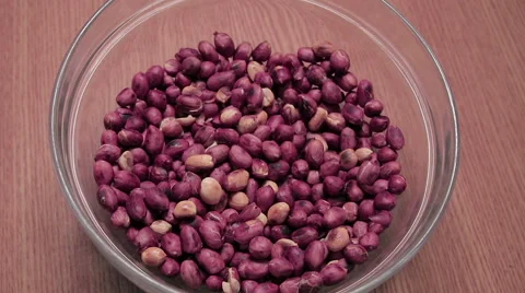 Roasted peanuts in bowl plate Stock Footage 61741552