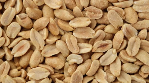 Roasted peanuts top view rotation. salted snack to beer Stock-Footage 145244793