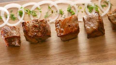 Roasted pieces of beef, fresh barbecue food Stock Footage 165529040