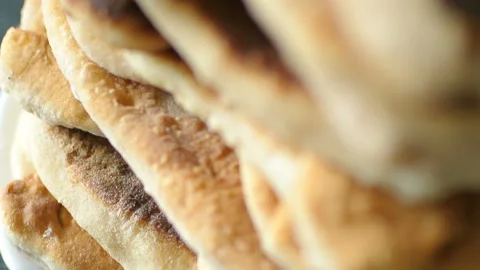 Roasted pies in column close up panning macro fresh tasty Stock Footage 108853966