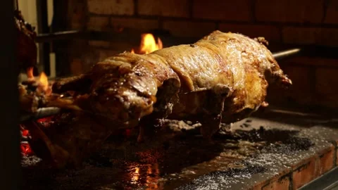 Roasted pig on spit 스톡 동영상 257963428