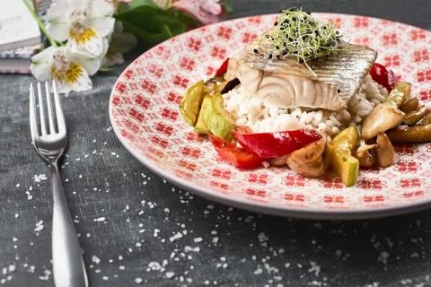 Roasted Pike perch perch with vegetables and rice risotto Stock Photos