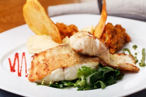 Roasted pikeperch fillet with mashed potatoes Stock Photos