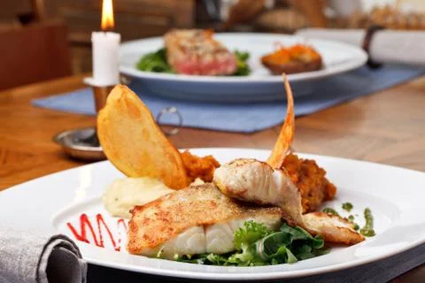 Roasted pikeperch fillet with mashed potatoes Stock Photos