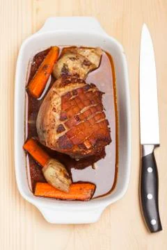 Roasted pork in a baking dish Stock Photos