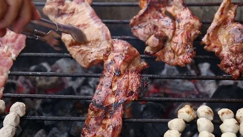 Roasted pork on barbecue grill. Stock Footage 77326976
