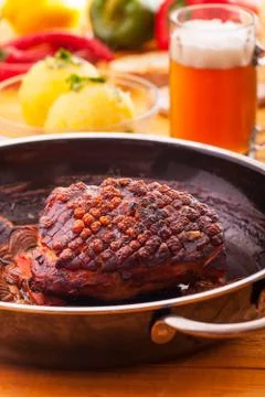Roasted pork dish in a pan Stock Photos