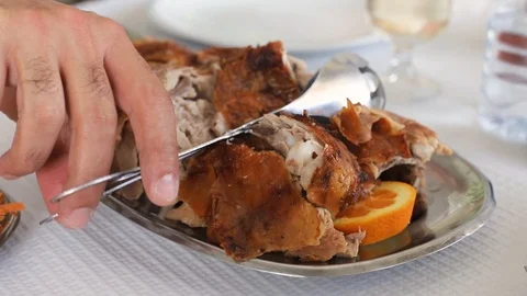 Roasted pork in dish on the table in restaurant Stock Footage 114614227