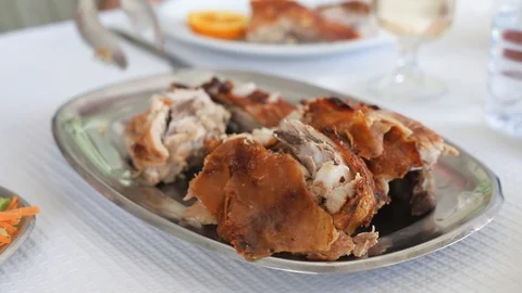 Roasted pork in dish on the table in restaurant Video stock 114614232