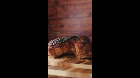 Roasted Pork Joint Steaming on Board Stock Footage 325682983