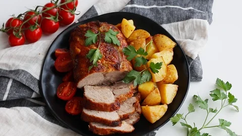 Roasted pork with potatoes. Top view Stock Footage 89753414
