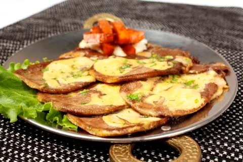 Roasted Pork steak on bone stuffed with cheese, grilled vegetables Stock Photos