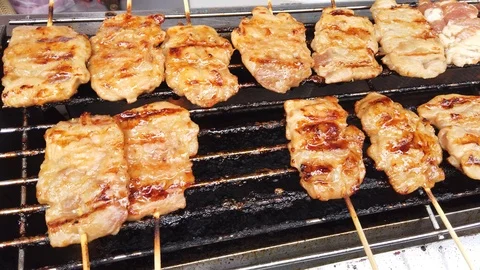 Roasted pork stick on grill, BBQ Thai style Stock Footage 100888964