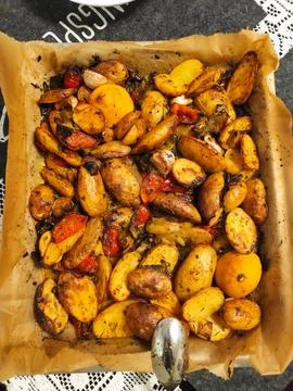 Roasted Potatoes and Vegetables on a Baking Tray Photos