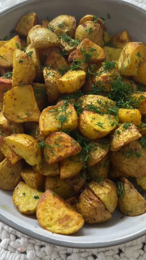 Roasted Potatoes with Fresh Herbs Video stock 320851398