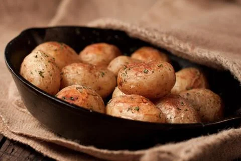 Roasted potatoes Foto stock