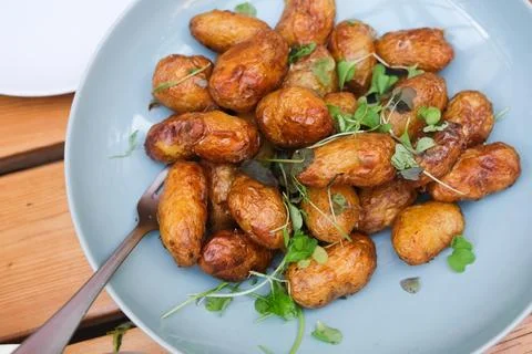Roasted potatoes Stock Photos